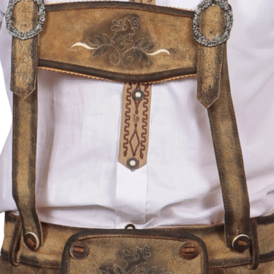 – Detailed view of brown leather suspenders on a white shirt, highlighting the embroidered leaf design on the front cross strap.